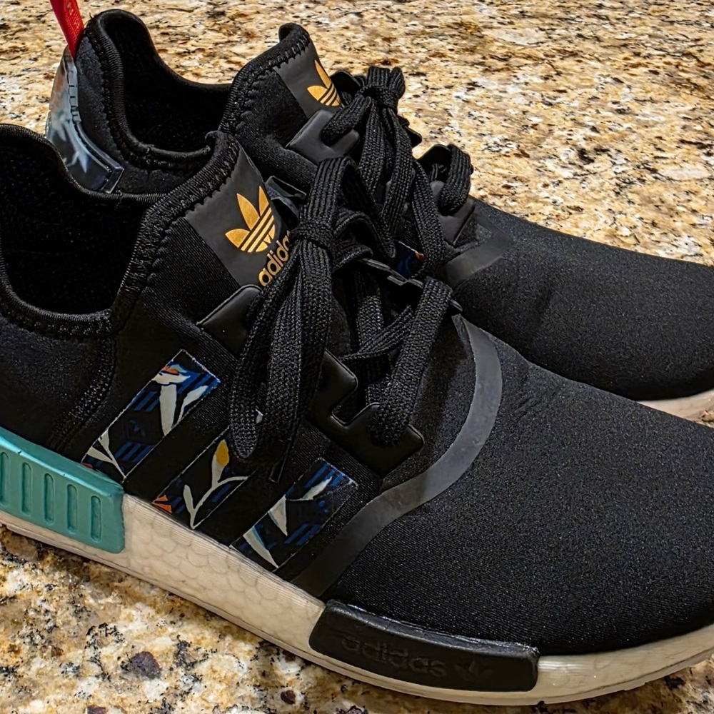 Adidas Black and Gold NMD Sneakers